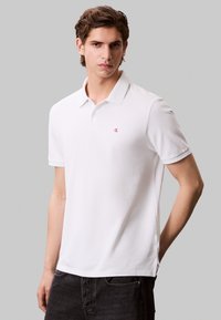 Calvin Klein Jeans Polo shirt - blanc de blanc