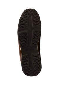 Suela de zapato de goma marrón con patrón de tracción en zigzag y diseños hundidos. Presenta la marca "RED SKINS" en el área del tacón.