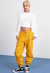 Jordan PANT - Trainingsbroek - yellow ochre