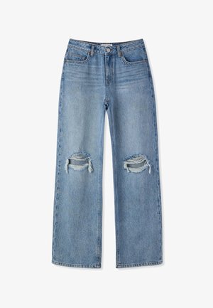 Jeans in denim azzurro chiaro con vita alta, gamba larga e due buchi usurati sopra le ginocchia. Presentano cinque tasche e una chiusura con bottone.