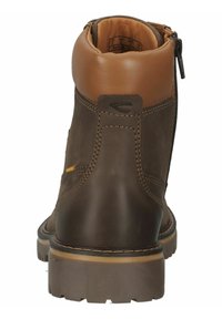 Brown leather ankle boot with tan accents, a side zipper, reinforced stitching, and a rubber sole featuring a rugged tread pattern.