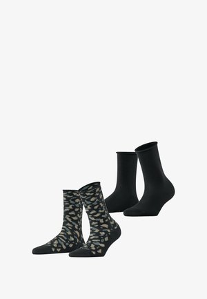 Dwie pary skarpetek: jedna para ma wzór w cętki w kolorach czarnym, beżowym i szarym; druga para jest w jednolitym czarnym kolorze z gładką fakturą.