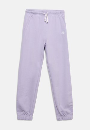 Pantalon de survêtement violet clair avec poignets et taille élastiques, cordon blanc, poches latérales et petit logo blanc sur la cuisse droite.