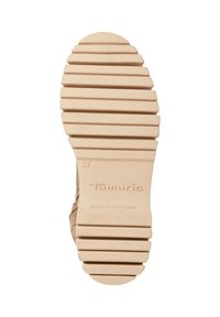 Suola di scarpa in gomma beige, con scanalature orizzontali per la presa. Impressa con "Tamaris" e "FATTO IN PORTOGALLO," taglia 37 ben in evidenza.