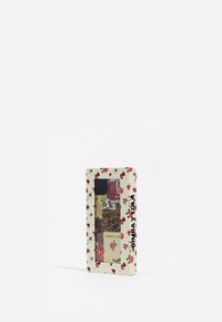 Juego de productos fragantes en una caja decorativa con patrones florales, colores vivos y estampados de animales. La caja incluye una ventana transparente para mayor visibilidad.