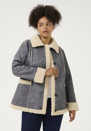 Gray shearling jacket with cream-colored faux fur collar and cuffs, featuring button closures and side pockets. Textured fabric looks warm.