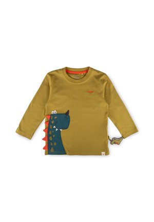 Children’s long-sleeve mustard shirt with a blue dinosaur graphic on the side and a small 3D dinosaur tail attached to the sleeve.