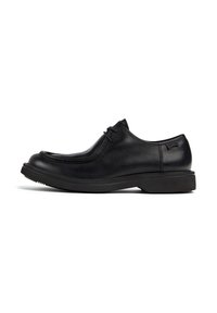 Schwarze Leder-Schnürschuhe mit dicker Sohle und runder Zehenpartie, von der Seite auf einem weißen Hintergrund betrachtet.