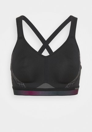 Reggiseno sportivo nero con design testurizzato, spalline incrociate e fascia accentuata multicolore. Presenta coppe modellate e dettagli sui pannelli laterali.