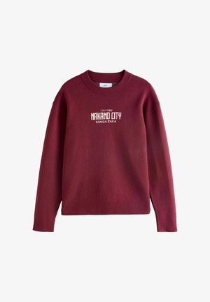 Burgundia säärise crew kaelusega, esiosas on valge kiri „TOKYO NAKANO CITY RENGA ZAKA“ tikitud. Pehme kudum.