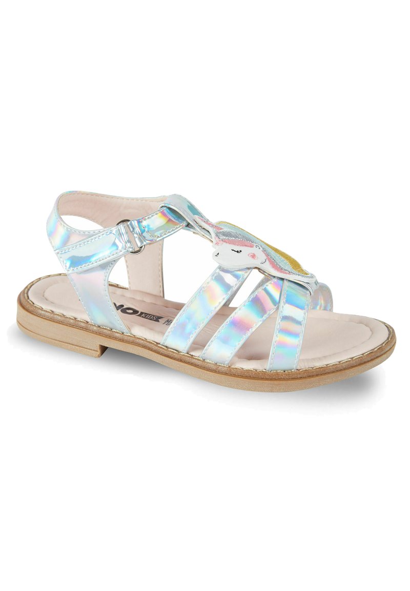 Iridescent hopeasalakset, joissa on litteä pohja, kolme hihnaa, solkilukko ja värikäs yksisarvinen kuvio etupuolella.
