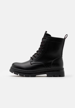 Platform-nilkkurit - black