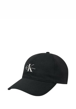 Cappellino da baseball nero in cotone con visiera curva, dotato di un logo ricamato bianco "CK" e della scritta "Calvin Klein Jeans" nella parte frontale.