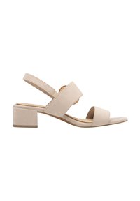 Sandalo con tacco blocco in suede beige, con due ampie cinghie per il piede, una cinghia posteriore alla caviglia e un accento circolare di lato. Suola piatta.