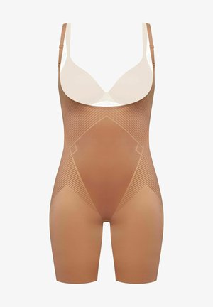 Nude bodysuit with smooth fabric, deep scoop neckline, adjustable straps, and geometric pattern details across the torso.