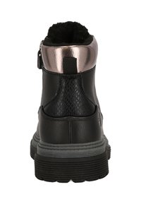 Black ankle boot with a textured finish, metallic copper collar, gray rubber sole, and back zip for closure. Lined with soft, black material.