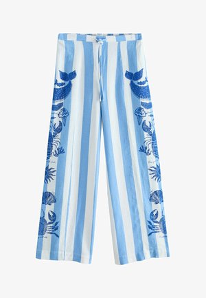 Wide-leg pants with vertical blue and white stripes, featuring blue sea creature prints like whales, crabs, and seashells on the sides and a drawstring waist.