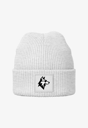 White knit beanie with a ribbed texture, featuring a black and white wolf graphic on a square patch at the front.