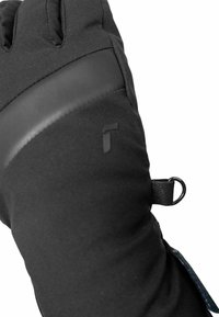Black winter glove featuring a textured exterior, padded sections, and a leather-like band. Includes a loop for attachment.