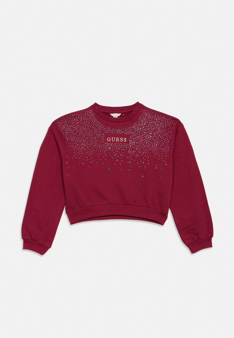 Burgundské zkrácené sweatshirt  s dlouhými rukávy, zdobené vícolorými kamínky a centrálním logem "GUESS" na hrudi.