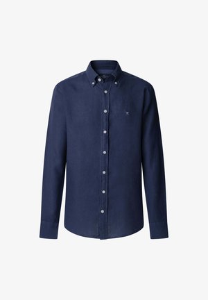 Granatowa koszula z guzikami, wykonana z miękkiego materiału. Długie rękawy, stożkowy kołnierzyk i małe wyszywane logo na piersi. Posiada jasne guziki.