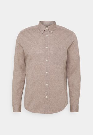 Overhemd met lange mouwen van lichtbruin, gestructureerd stof. Voorzien van een klassieke kraag, knopen en een borstzak.