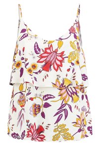 Haut sans manches blanc avec un design en couches présentant de grands motifs floraux en rouge, jaune, violet et rose, avec des feuilles vertes.