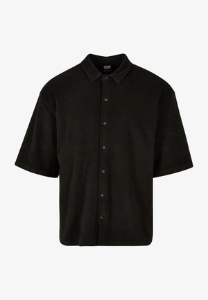 Fekete, rövid ujjú ing, puha anyagból készült, galléros nyakkal és hat elülső gombbal, laza szabással tervezve.