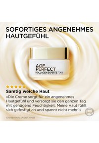 Vit burk med ett guldlock som är märkt "AGE PERFECT KOLLAGEN EXPERTE TAG." Omgiven av en krämig textur i mjuka beige nyanser som betonar produktens fuktgivande egenskap.