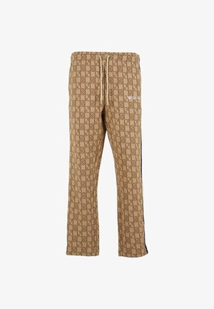 Pantaloni sportivi marroni a fantasia con vita regolabile tramite cordoncino e strisce sui lati, con un dettaglio del logo sulla parte anteriore.