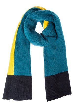 Écharpe tricotée avec des blocs de couleur en sarcelle, jaune et noir, pliée en boucle sur un fond blanc.