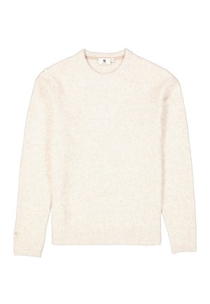 Suéter de cuello redondo en color beige claro, hecho de una tela suave y texturizada. Presenta puños y dobladillo acanalados, con una etiqueta en el cuello. Diseño sencillo.