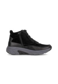 Black high-top sneakers featuring a mix of suede and leather, zipper detail on the side, and a thick gray rubber sole with textured accents.
