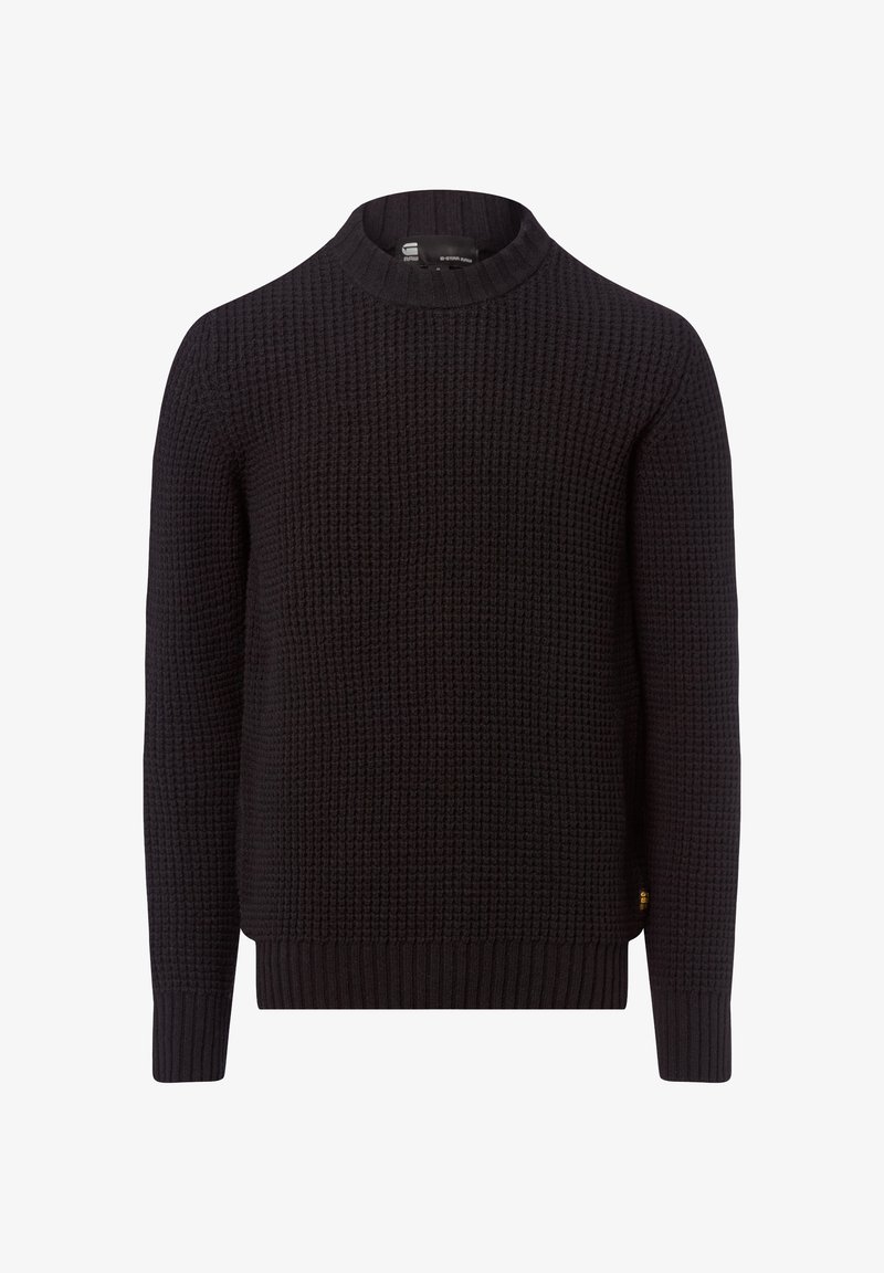 Zwarte gebreide trui met een ronde halslijn, een textuurpatroon en geribbelde manchetten en zoom. Beschikt over een klein logo aan de zijkant.