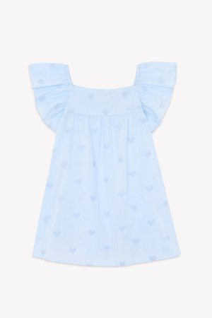 Light blue cotton dress with ruffled sleeves, embroidered hearts, and a loose, flowy fit. Soft texture with a square neckline.