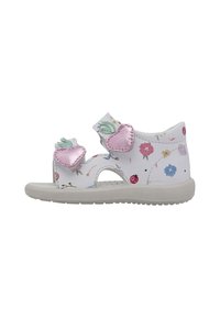 Witte sandaal met bloemmotieven, roze metallic hartaccenten en groene bladdetails. Klittenbandsluitingen en een lichtgrijze rubberen zool.