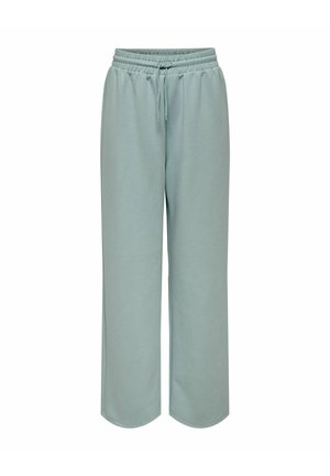 Lyse blågrønne vid bukser i sweats materiale med elastisk talje og justerbar snor, vist på en ensfarvet hvid baggrund.