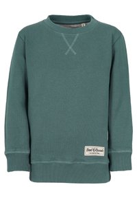 Turkisgrøn sweatshirt med rund halsudskæring, ribbede manchetter og kant. Har et syet korsmønster ved halsudskæringen og et mærke på forsiden.
