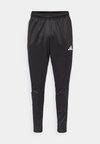 TIRO - Tracksuit bottoms - black/white