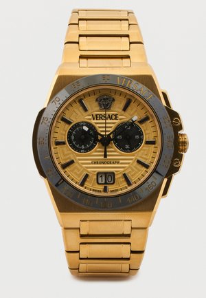 Orologio da polso cronografo Versace in oro con quadranti secondari neri, datario, logo Medusa e bracciale in metallo a maglie.