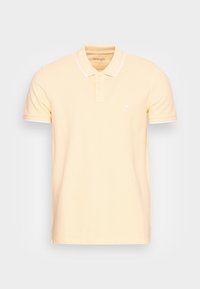 Gul pikétröja i bomull med krage, treknappsstängning och vit kant på kragen och ärmarna.