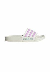 White slide sandal with three purple stripes, textured upper, and bold "adidas" branding in mint green on the strap. Flat sole design.