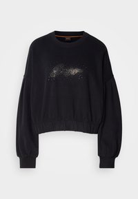 Sweat-shirt court noir à manches longues avec taille et poignets froncés, avec un logo "BOSS" argenté à pois sur la poitrine.
