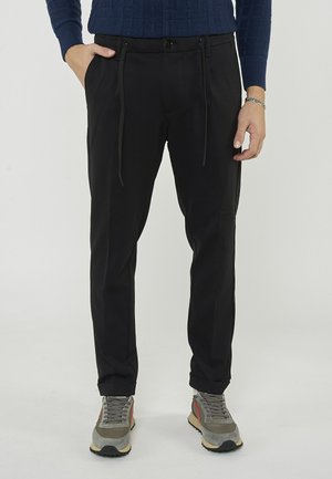 CON COULISSE - Pantaloni - nero