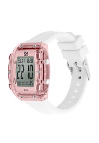 Montre numérique avec un boîtier en plastique translucide rose, un bracelet en silicone blanc et un affichage numérique montrant l'heure, la date et plusieurs fonctions.