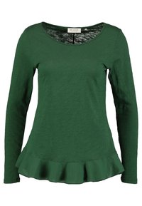 Green long-sleeve top with a scoop neckline and a flared hem. Made of a soft fabric with a smooth texture and subtle sheen.
