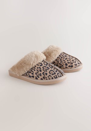 Zapatillas con estampado de leopardo con un suave forro de piel sintética beige, suela flexible y forma redondeada para mayor comodidad y calidez.