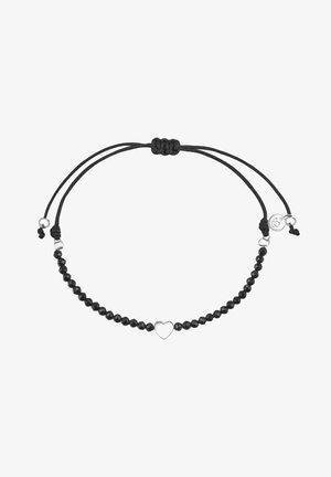 Bracelet réglable à perles noires avec un charm en forme de cœur argenté central et de petits accents argentés sur un cordon noir.