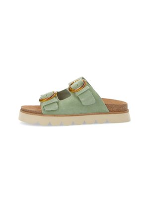 Green suede slide sandal with two adjustable straps, gold-tone round buckles, cork footbed, and a scalloped beige rubber sole.