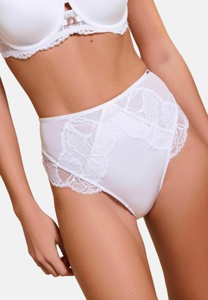 High-waist white lace and mesh panties worn by a woman shown from mid-torso to upper thighs against a light background.